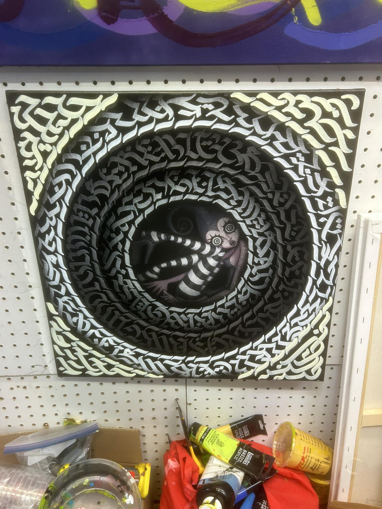 Calligraffiti spiral with snake in black and white