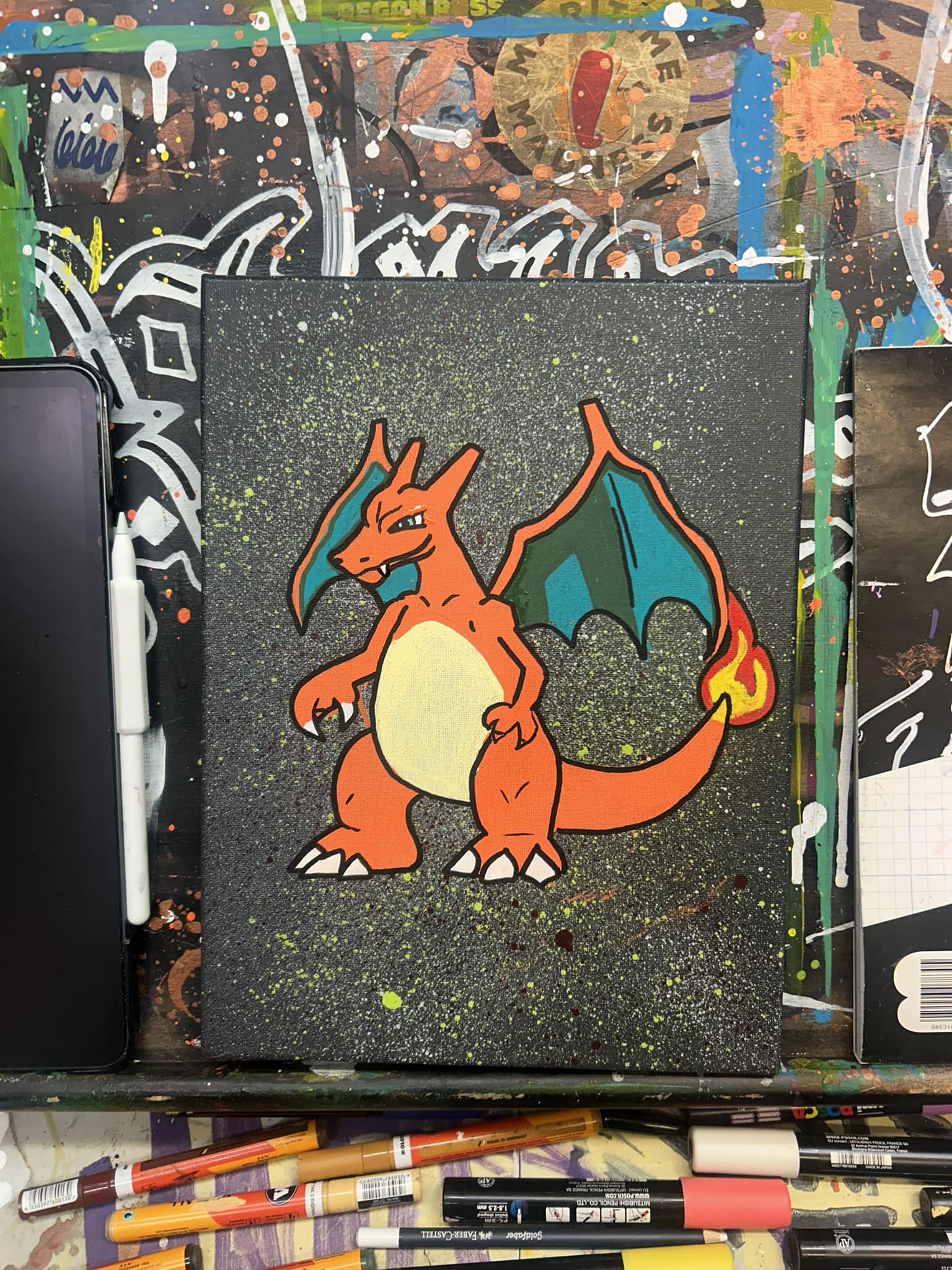 Charizard painting on dark speckled background