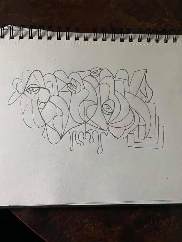 Abstract graffiti letterforms with drips in spiral notebook