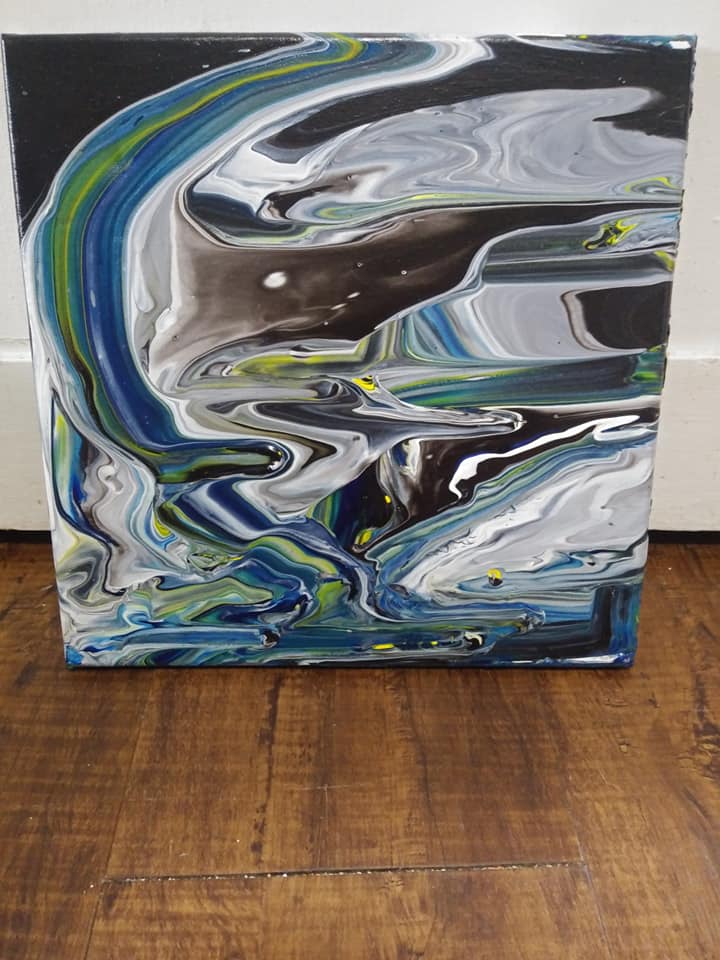 Blue black and white abstract pour painting