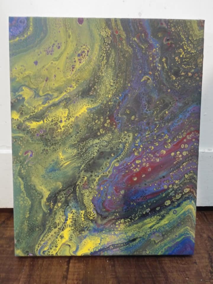 Yellow green and purple abstract pour painting with cells