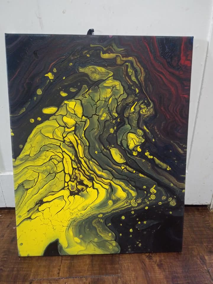 Yellow and black abstract pour painting with crackle